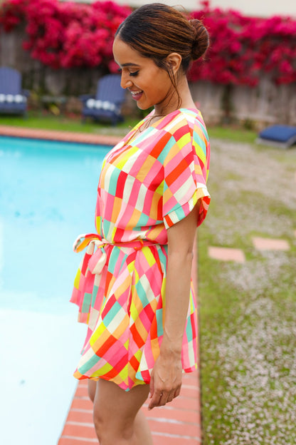 Eyes On You Coral Geo Abstract Surplice Woven Romper